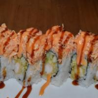 Paradise Roll · shrimp tempura, cucumber, avocado topped with spicy snow crab, tobiko, spicy mayo, eel sauce.