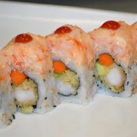 Spicy Girl Roll · Pepper salmon, avocado inside, spicy tuna on top with chili, spicy sauce, 7 spice