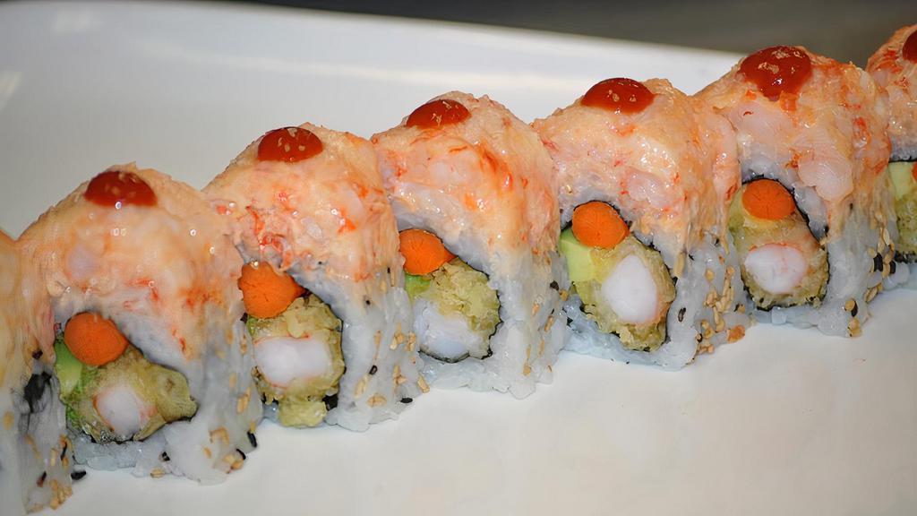 Spicy Girl Roll · Pepper salmon, avocado inside, spicy tuna on top with chili, spicy sauce, 7 spice