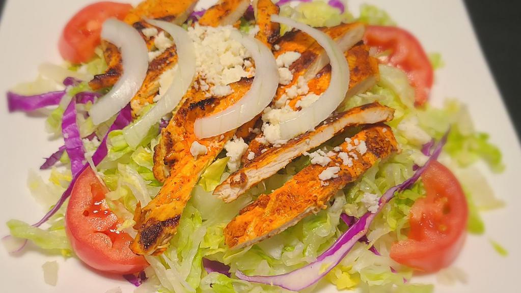 Chicken Salad · Grilled chicken strips, mixed greens and toppings.