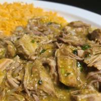 Carnitas · Fried roasted citrus-marinated pork chunks with flour tortillas. Served with rice, and choic...