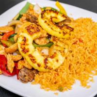El Jarocho · Grilled marinated shrimp, chicken, and scallops cooked with onion, tomatoes, pineapple, mush...