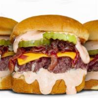 Sliders · (3) 2oz Beef Patties, Topped with American Cheese, Caramelized Onions, Pickles and Secret Sa...