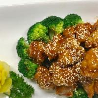 Sesame Chicken芝麻鸡 · Popular item. Lightly breaded crispy chicken W/ sweet ginger sauce,( garnish with broccoli a...