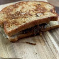 Patty Melt · 1/4 Ground Beef with grilled onions, ground mustard and Swiss cheese on Rye Bread