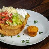 Taco Salad · Crispy flour shell tortilla with beef or chicken and beans (re fired or black), lettuce, tom...
