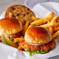 Fried Chicken Sliders Duo · 2 pieces of all white meat chicken coated in seasoned breading and fried crispy, topped with...