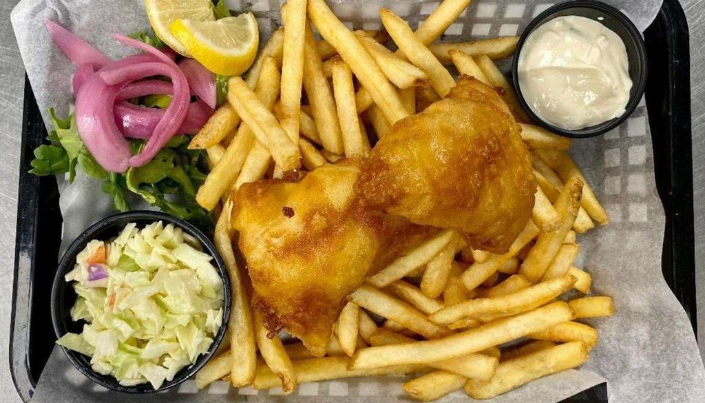 Fish & Chips · Beer battered walleye served with crispy French fries, creamy coleslaw, and homemade tartar sauce