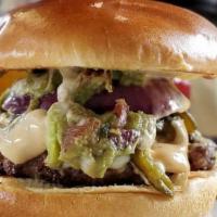 El Camino Burger · Guacamole, feta cheese, roasted jalapeno, grilled red onion and chipotle aioli