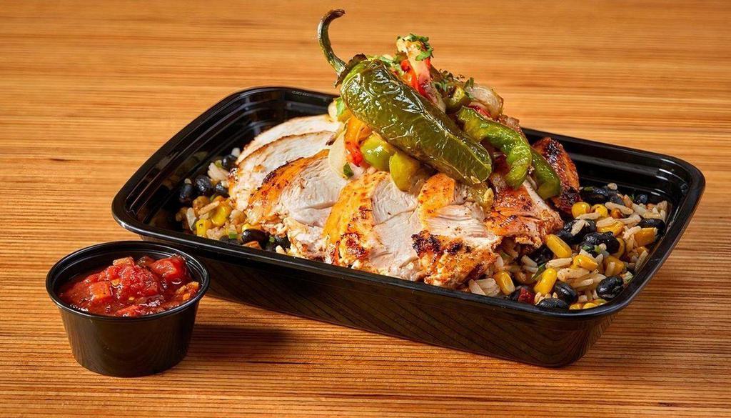Fiesta Chicken Bowl · Chipotle grilled chicken breast, fajita peppers and onion, seasoned brown rice, roast corn and black beans, fire roasted salsa, roasted jalapeño. Please note that there are no substitutions or modifications available.