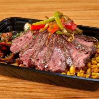 Gaucho Steak · Sirloin tip steak with chimichurri sauce, mushroom potato hash, chili roasted corn, and gril...