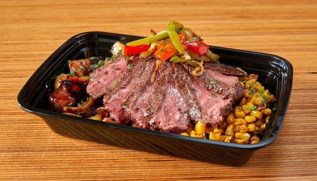 Gaucho Steak · Sirloin tip steak with chimichurri sauce, mushroom potato hash, chili roasted corn, and grilled peppers and onions. Please note that there are no substitutions or modifications available.