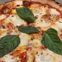 Margherita · Pomodoro sauce, fresh mozzarella, basil