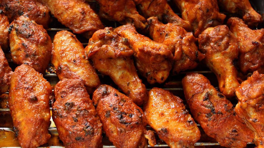 1 Lb - Pub Wings · Our locally famous chicken wings, tossed with your choice of sauce and finished on the grill.   No split-sauce order, once sauce per pound.