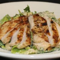 Grilled Chicken Caesar Salad · Romaine with grilled chicken, croutons, parmesan cheese and topped with Caesar dressing.