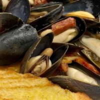 Poached Mussels · White Bean, Roasted Tomatoes, Chorizo served with toasted French Baguette slices
