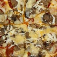Traditional Pizza · Italian sausage, pepperoni, mushrooms, and fresh herb marinara.