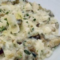 Mushroom Risotto · Tossed in Truffle Oil