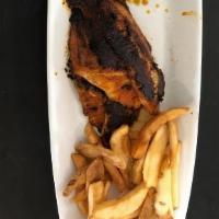 Cajun Catfish Filets · Seared blackened style. Served with Remoulade sauce, Coleslaw, and Steak Fries.