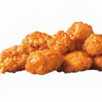 Buffalo Sauced Jumbo Popcorn Chicken® · Our Jumbo Popcorn Chicken made with breaded 100% all-white meat chicken and coated in a spic...