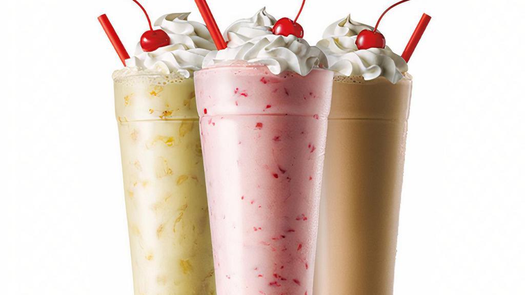 Hand-Mixed Classic Shakes · Real Ice Cream hand-mixed with your favorite flavors into a thick, cold, creamy shake and finished with whipped topping and a cherry. The perfect treat or addition to your meal.