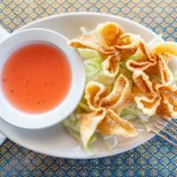 Crab Rangoon (4) · Cream cheese green onions, white onions and crab meat salad.