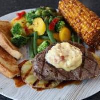 Mango-Pineapple Sirloin Steak* · A 6 oz. sirloin atop a bed of grilled pineapple and our mango-chile glaze, then topped with ...