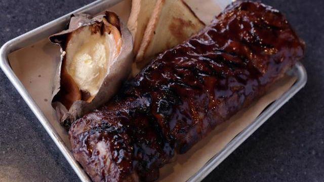 Baby Back Ribs Full Rack · Sweet, smoky and grilled to perfection. Your choice of original BBQ or our honey-chipotle BBQ sauce. Served with your choice of two sides.