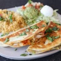 Lunch Chicken Quesadilla · Served with Santa Fe rice.