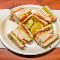 Red Olive Club · Triple decker club with real turkey breast, bacon, lettuce, tomatoes, and mayo.