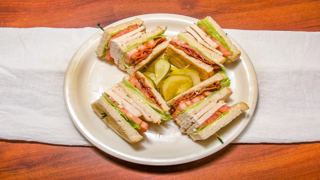 Red Olive Club · Triple decker club with real turkey breast, bacon, lettuce, tomatoes, and mayo.