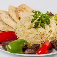 Beef Kebob · Grilled green peppers, red peppers, mushrooms, onion, 5 pieces of beef tenderloin, served wi...