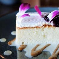 Tres Leches Cake · Moist cake made with three kinds of milk,topped with drunken berries
