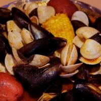 Mussels & Clams · 1/2 pound Mussels & 1/2 pound Clams,come with 2 potatoes&1 cron