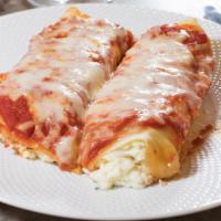 Manicotti · Large noodles stuffed with our homemade parmesan ricotta filling and baked in your choice of...