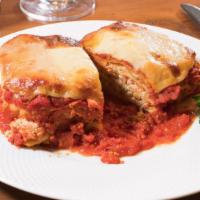 Lasagna · Generous layers of pasta, Italian-seasoned ground beef, ricotta, and provolone cheese, baked...