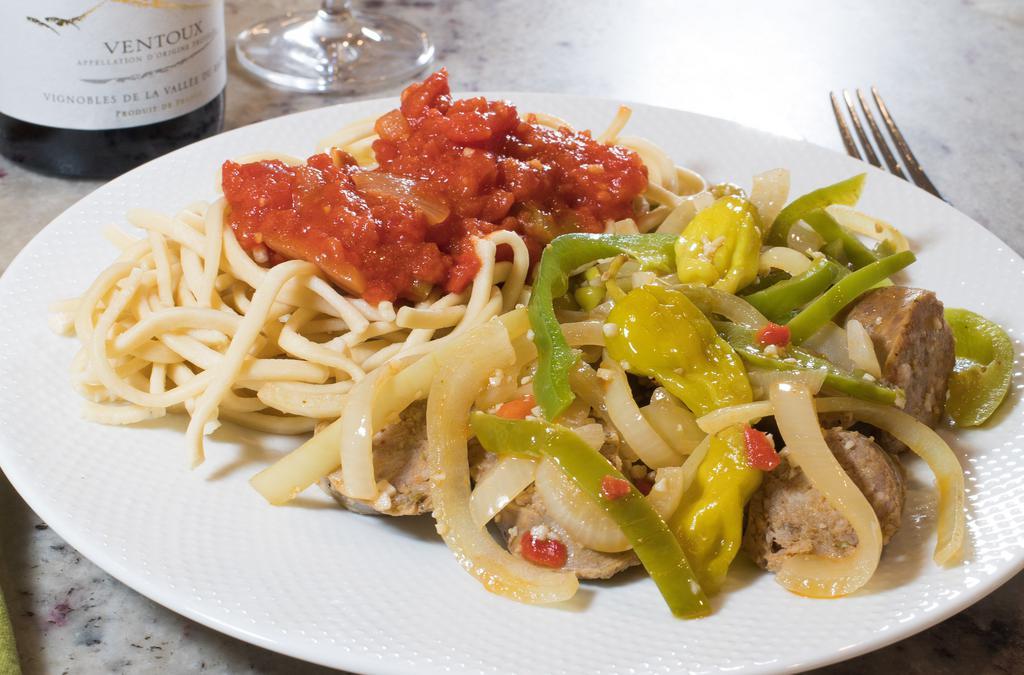 Italian Sausage · Baked Italian sausage smothered with sautéed mushrooms, onions, and peppers; served with homemade spaghetti