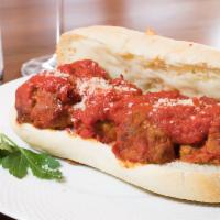 Meatball Capri · Three homemade meatballs stuffed in a hoagie roll and baked with our Marinara and Italian ch...