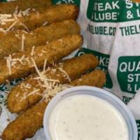 Pick-Up Pickles · Crispy battered and fried dill pickle spears with ranch or spicy jalapeno ranch dressing for...