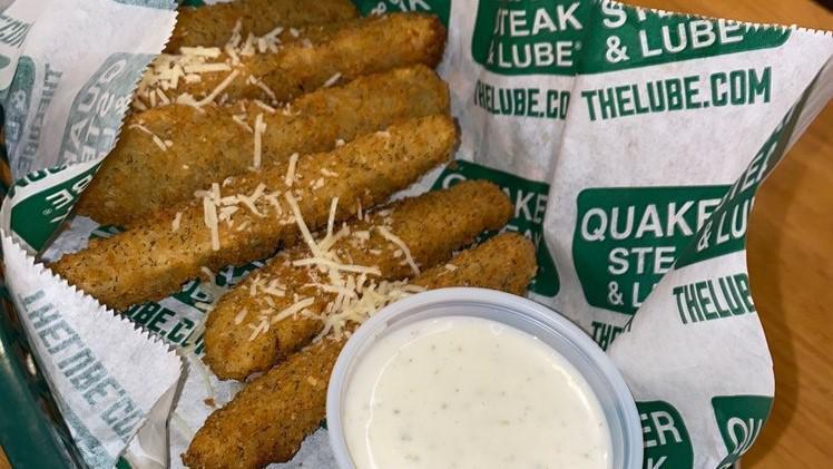 Pick-Up Pickles · Crispy battered and fried dill pickle spears with ranch or spicy jalapeno ranch dressing for dipping.