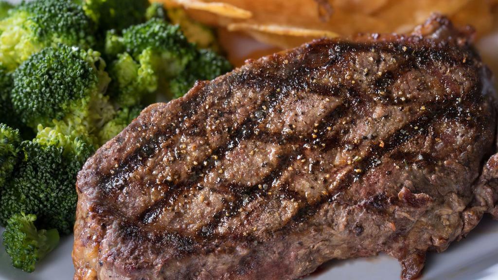 12 Oz Ny Strip Steak · USDA choice, lean and extra tender. Served with grilled garlic bread, plus your choice of two regular sidecars.
