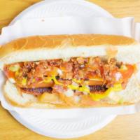 Mexican Hot Dog · Bacon, Onions, Tomatoes, Mustard, Mayonnaise, Salsa & Ketchup.