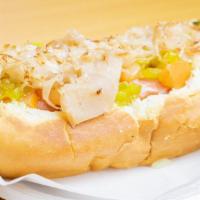 American Hot Dog · Onions, Tomatoes, Relish, Mustard, Mayonnaise, Salsa, Ketchup, Sauerkraut.