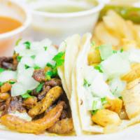 4 Tacos · Onions, Cilantro y Salsa.