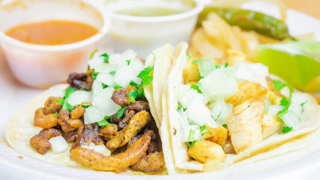 4 Tacos · Onions, Cilantro y Salsa.