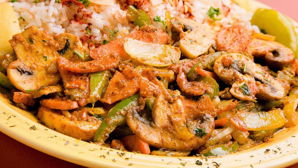 Chicken Ghallaba Entree · Sautéed green peppers, onions, carrots, tomato, fresh garlic and Mediterranean curry seasoning with chicken