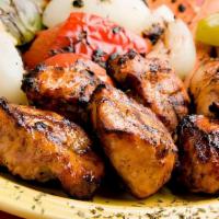 Chicken Kabob Entree · Tender marinated chicken breast cubes charbroiled