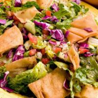 Fattoush Salad · Romaine lettuce, tomato, red cabbage, onion, cucumber, parsley, imported sumac tossed with f...