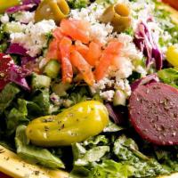 Greek Salad · Fresh Romaine, tomato, onion, beets, cucumber, green olives and feta cheese