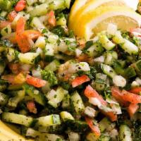 Cucumber Salad · A fresh mix of cucumber, tomato, onion and parsley